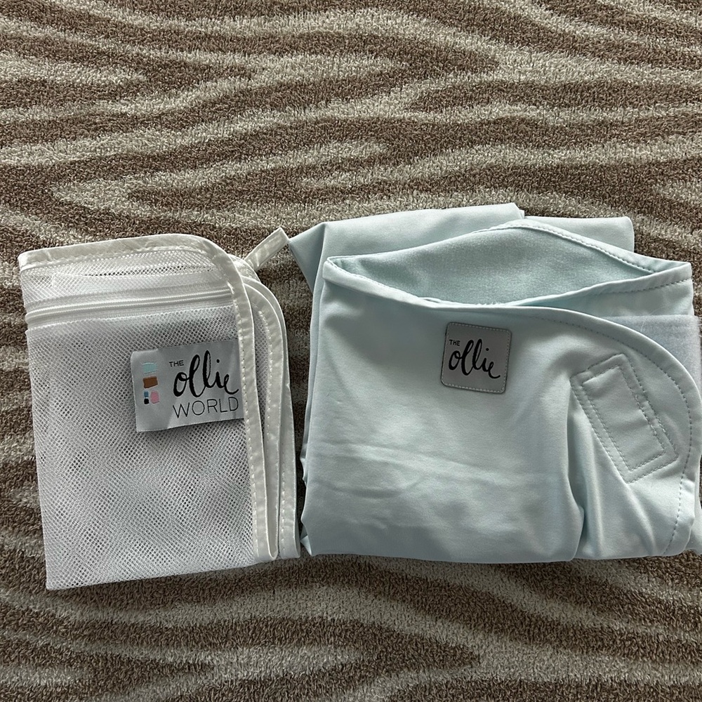 Ollie swaddle- light blue color in perfect condition!